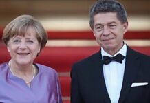 Муж Меркель Зауэр не отвечает на вопросы о частной жизни