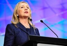 Что Хиллари Клинтон делает в Берлине?