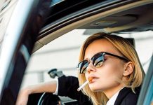 Курение в автомобиле: причины отклонения законопроекта