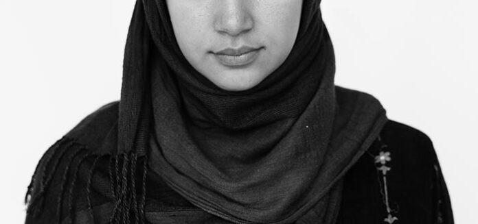 Middle eastern woman casual studio portrait