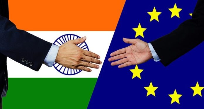 A business man shake each other hand, india and EU