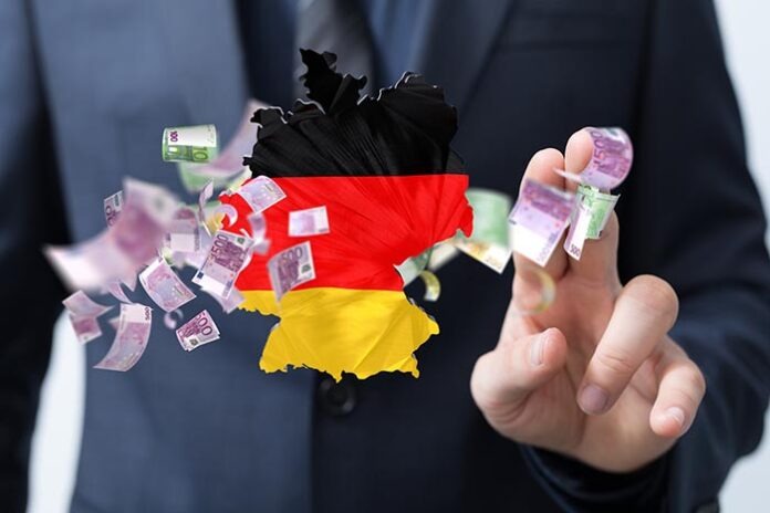 3d illustration of the map of Germany and money floating near a hand, economy