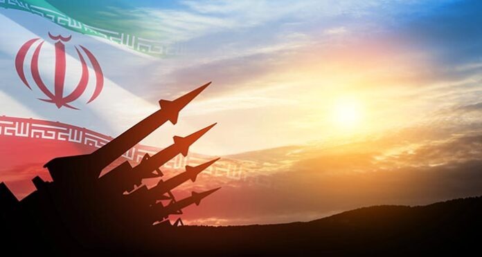 The missiles are aimed at the sky at sunset with Iran flag. Bomb, chemical weapons, missile defense.