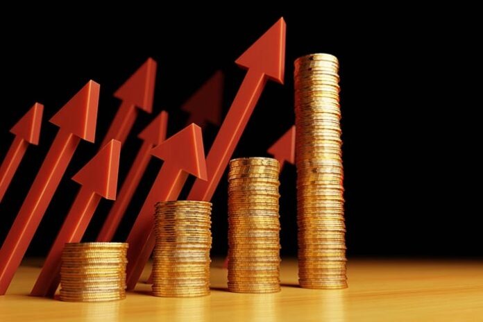 Inflation, prices rise concept. Coin stacks and red arrows repre