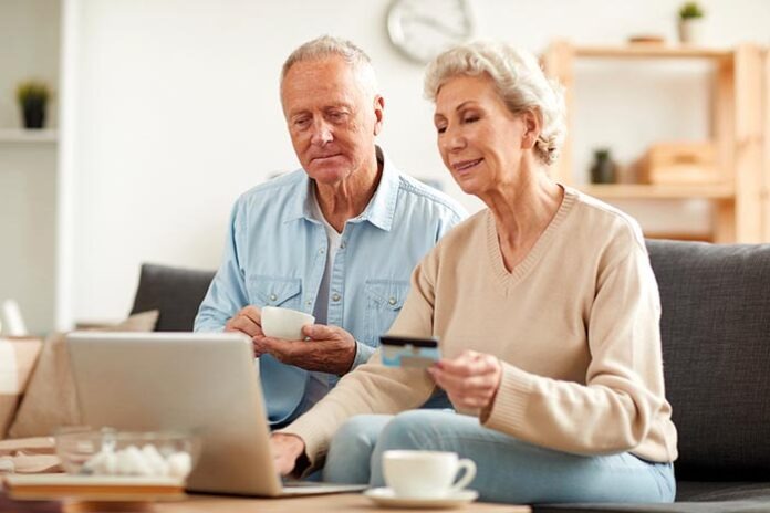 Senior Couple Shopping Online