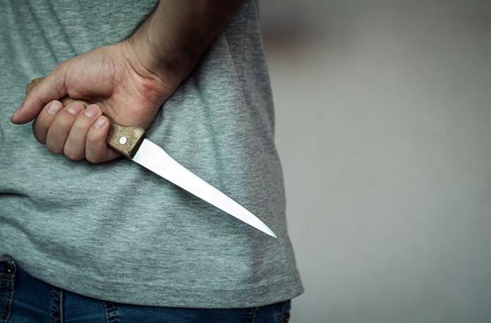 Criminal with knife.