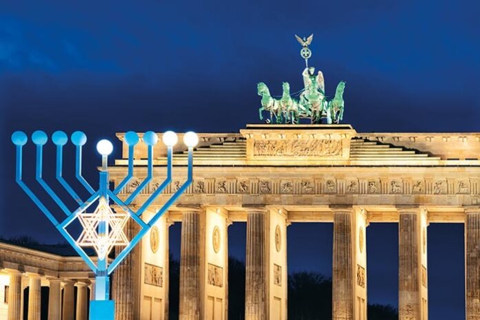 Hanukkah Menorah at Brandenburg Gate Building in Berlin