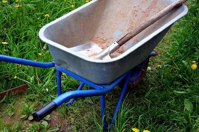 Garden cart and scoop close-up. A device for transporting cargo-