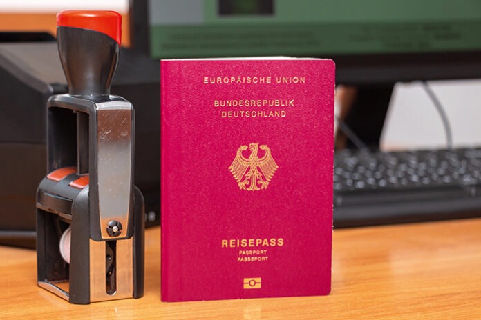 Vinous biometric passport of a German citizen with a border date
