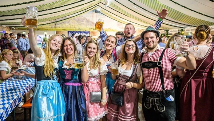 Koblenz Germany 27.09.2019 people party at Oktoberfest in europe during a concert Typical beer tent scene