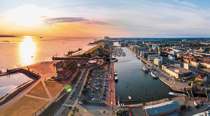 Sunset in Bremerhaven with houses and ships